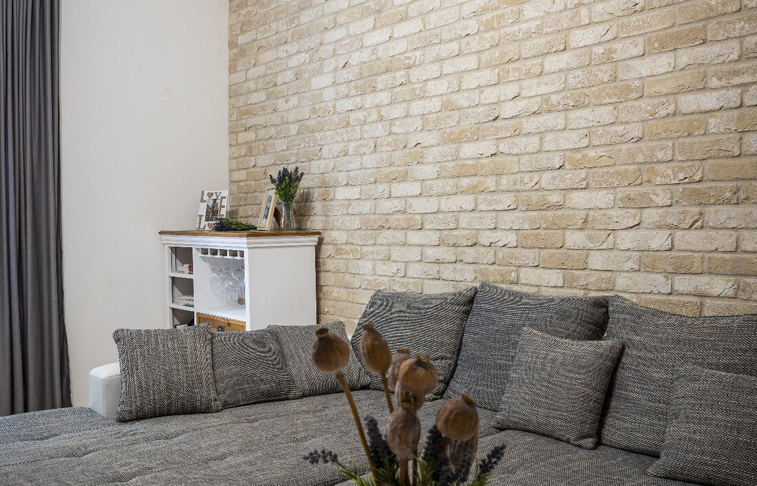 Tehlový obklad Antica Beige v interiéri bytu od Rustique.sk